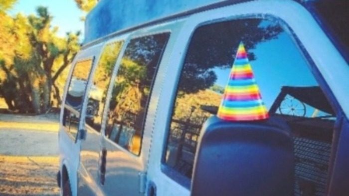 Allison's van with a party hat on the seat